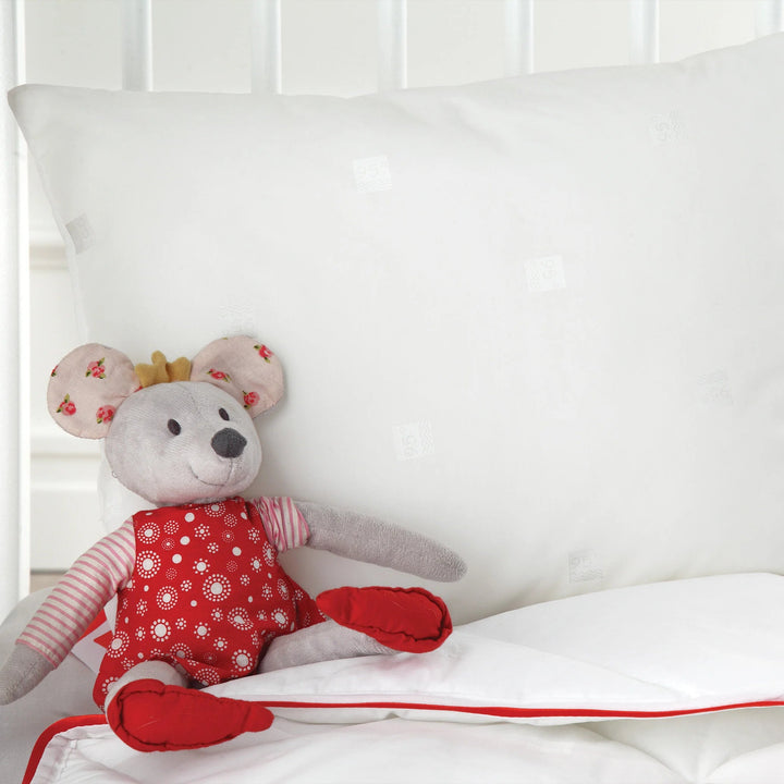 dacron_95_baby_pillow_next_to_toy